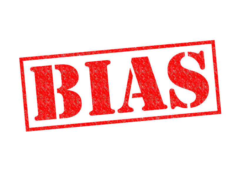 bias red rubber stamp over a white background.