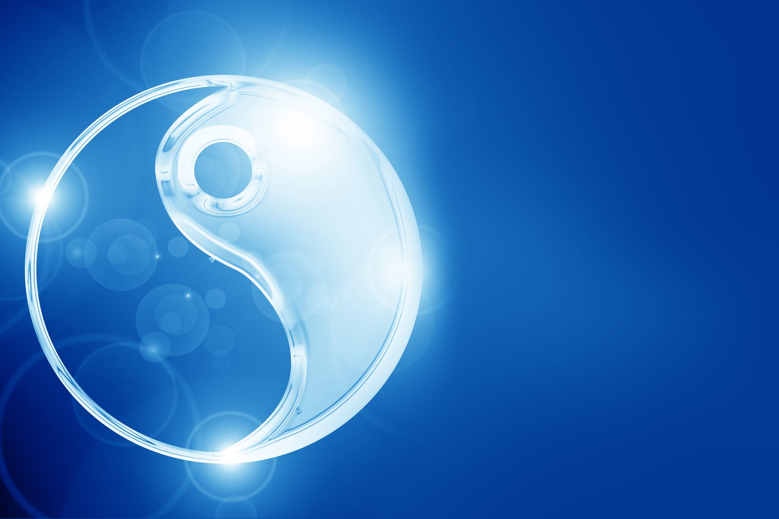 yin yang sign on a glowing background